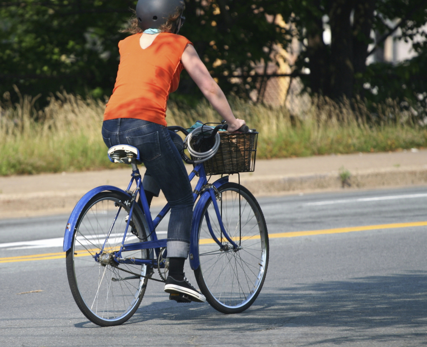 Person on a bike with helmet