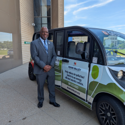 Executive Director Brian Martin with Gest Cart EV showcase